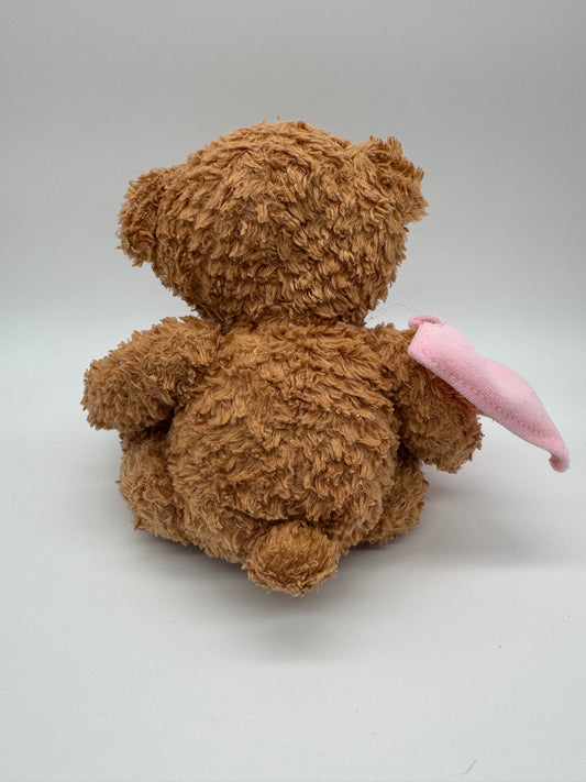 Teddybär mit Tuch verletzt