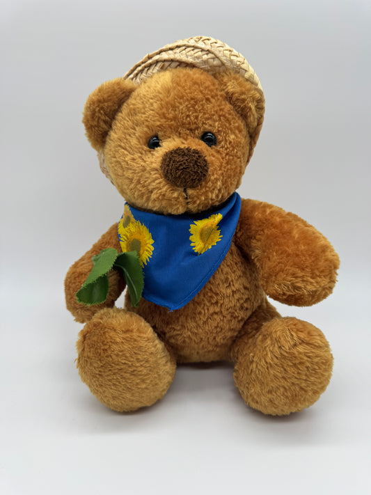 Teddybär mit Sonnenhut